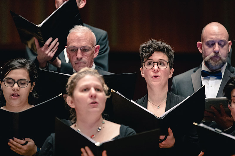 Windy City choir members singing together